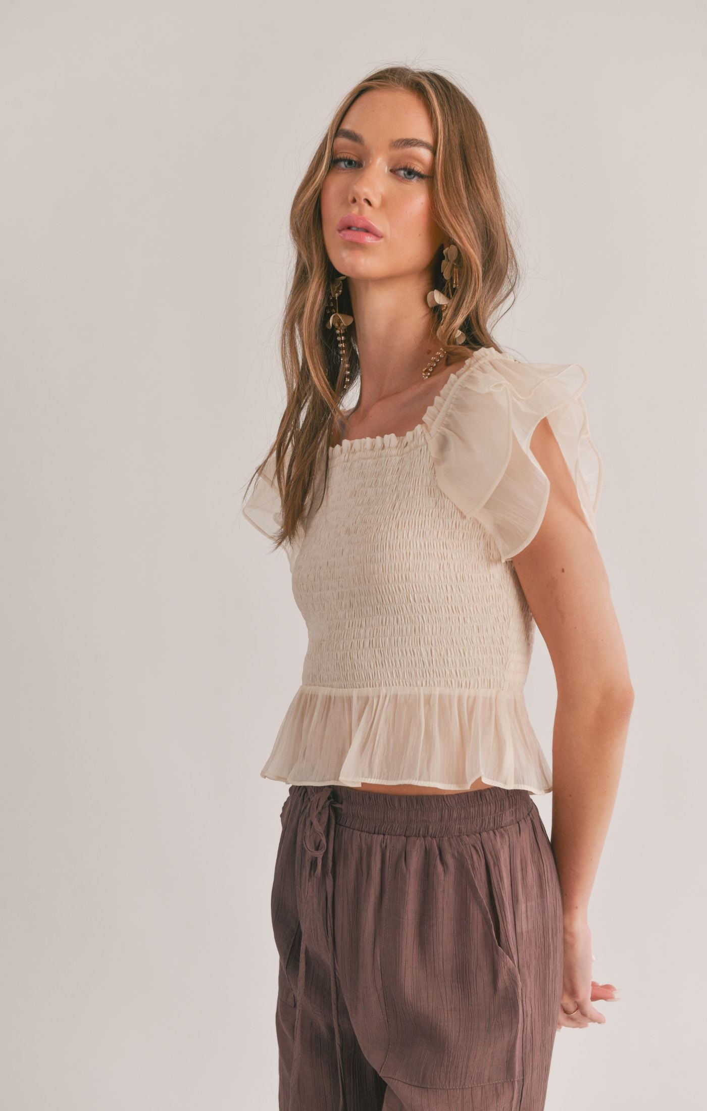 Blurred Smocked Ruffle Peplum Top